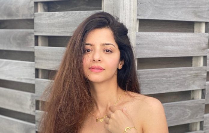 Vedika Kumar wearing white bralette and shorts gave bo*ld pose photos went viral on social media