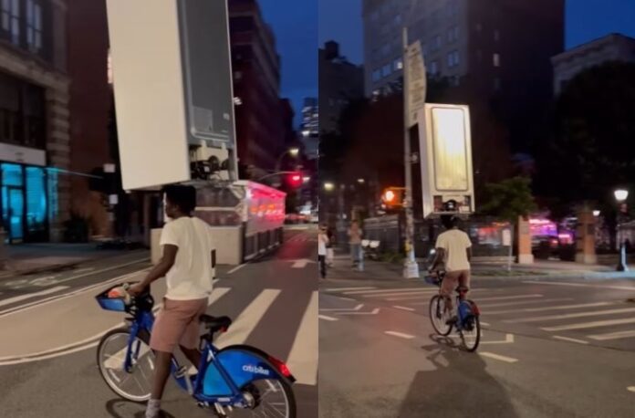 Viral Video: Video of a boy riding a bicycle with a refrigerator on his head goes viral; People said is it neck or iron?