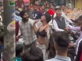 Video of public beating up a bra clad youth in market goes viral - Watch