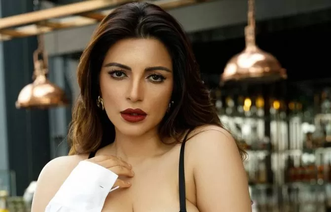 Shama Sikander's hot look in two-piece will blow your mind! Killer pose sitting on the bed