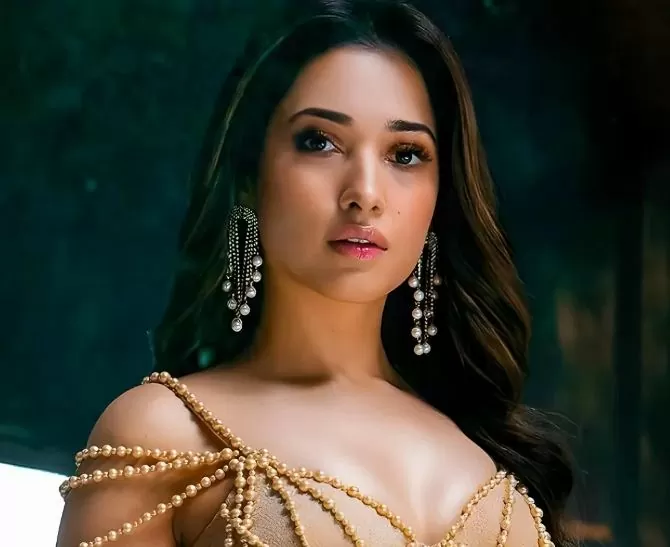 Tamannaah Bhatia did a bo*ld photoshoot in a half shoulder deep neck dress, fans pressed their fingers under their teeth