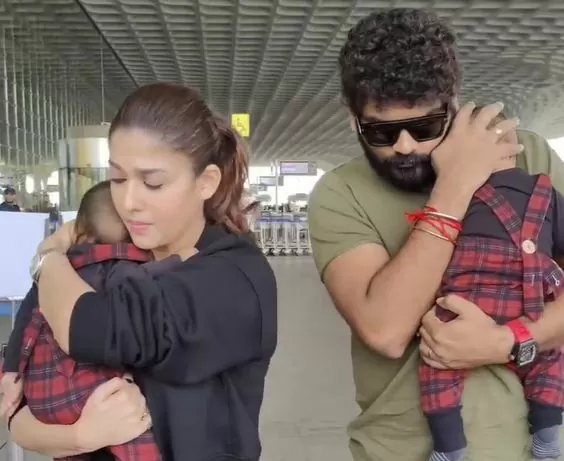 Nayanthara and Vignesh were seen with twins at the airport, hidden face, users said - kidnapping and taking away