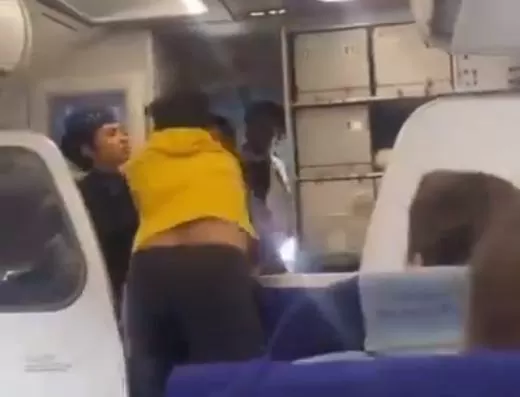 WATCH: Passenger punches plane captain for making announcement in flight, video goes viral